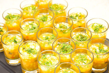 Fruity dessert. The mix of fruits in portion cups