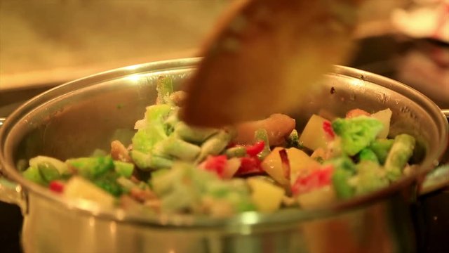 Frozen mixed vegetables cooking in pot