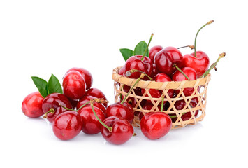 Cherry in basket on a white background