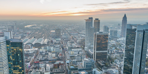 Aerial view of metropolis skyline at dusk, business concept