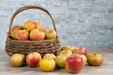 basket of apples on the wooden table