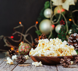 popcorn on the background of Christmas and New Year's decorations, selective focus