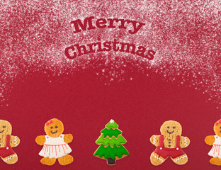 Christmas cookies of different shapes and sizes with a festive decor on a red background. Holiday Poster concept.  Empty place for a postural inscription