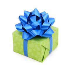 Photo of green gift box with a blue ribbon isolated on white background