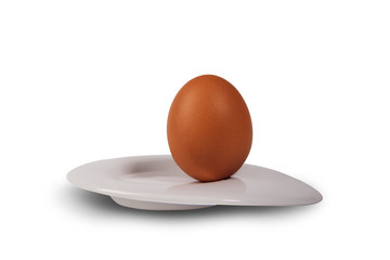 yellow egg and white plate on a white