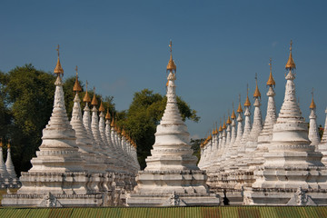 Fototapeta premium Mandalay. Myanmar. 20 November 2016. The Sandar Mu Ni pagoda - the world biggest book. In each of the 758 stupas carved in stone one page of the Holy Book.