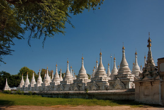 Mandalay. Myanmar. 20 November 2016. The Sandar Mu Ni pagoda - the world biggest book. In each of the 758 stupas carved in stone one page of the Holy Book.