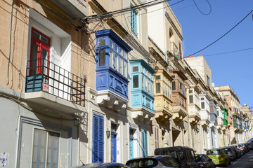 The traditional Maltese colorful wooden balconies in Sliema on Malta