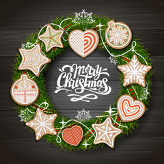 Fototapeta na wymiar Top view of Merry Christmas concept design. Christmas wreath with cookies on wooden background. Christmas food