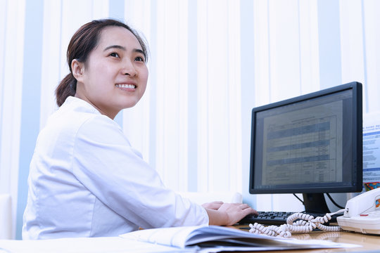 Doctor using computer