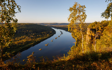 Autumn Urals landscape, river, stones, mountains. Vishera river.