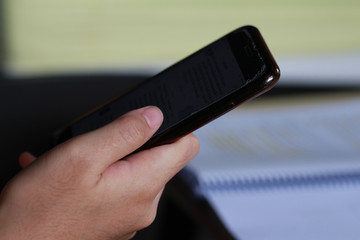 holding and using smartphone