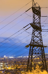 High-voltage lines on background with twilight Barcelona