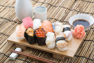 nigiri sushi on wooden board
