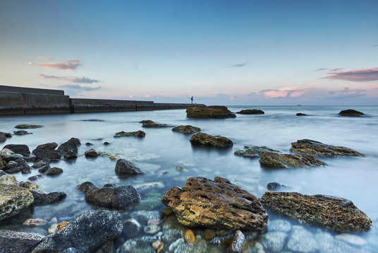 Rocks protruding from sea, Odessa, Odeska Oblast, Ukraine, Europe