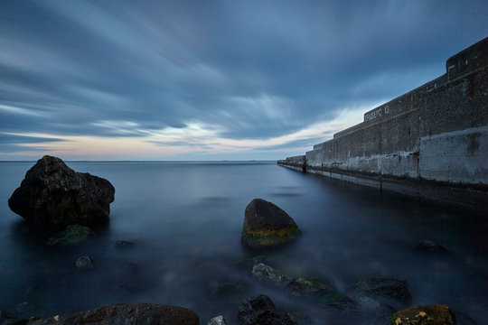 Rocks protruding from sea, Odessa, Odeska Oblast, Ukraine, Europe