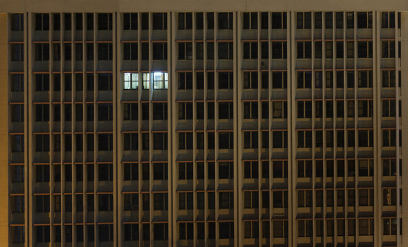 Illuminated office window in office building at night, Nairobi Area, Kenya, Africa