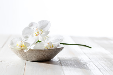 Obraz na płótnie Canvas beauty still life with white orchids for concept of hygiene
