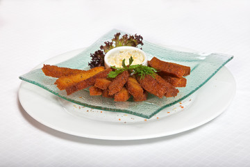 roasted garlic croutons and sour cream on a white background