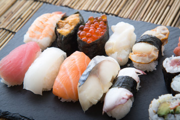 sushi on stone board
