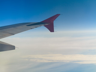 Beautiful white clouds and blue sky from plane
