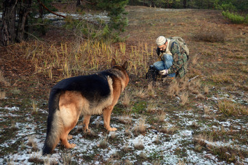 Man with metal detector,wears traditional Kazakh hat.Near Kiev

