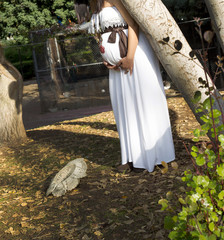 Portrait of the young pregnant woman.  Pregnancy, love, maternity and expectation concept. Pregnant Belly. Pregnant woman expecting baby