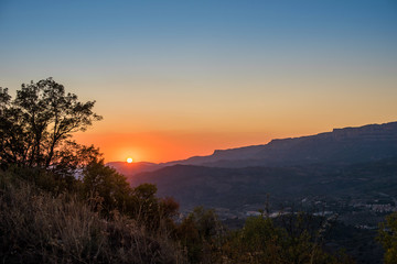 View of the mountain landscape at sunset in Siurana de Prades, Tarragona, Spain. Copy space for text.