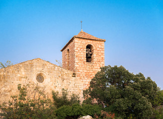 Fototapeta na wymiar View of the Romanesque church of Santa Maria de Siurana, in Siurana, Tarragona, Spain. Copy space for text.