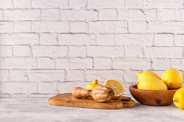 Lemons and juicer for making lemon juice.