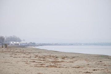 Empty sandy beach at winter