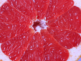 macro of cut red grapefruit