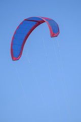 Kite surfing parachute in blue sky 1