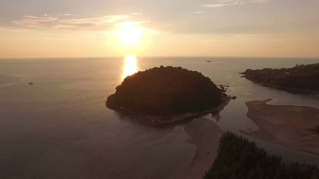 stunning sunset at Kala island. Layan beach and Bangtoa beach is the same beach the left side is Bangtoa beach the right side is Layan beach in the end of Layan beach has Kala island
