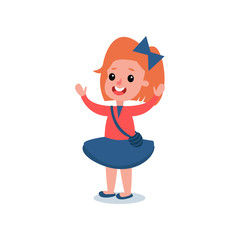 Cheerful red-haired girl in casual outfit red blouse, blue shirt, cross body handbag, bow in hair. Cartoon kid character standing with hands up. Flat vector design