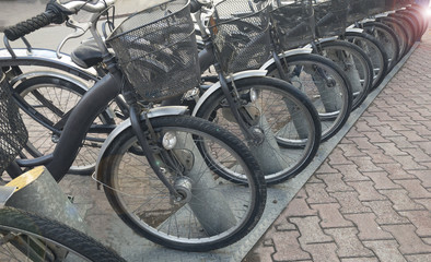 Obraz premium rental bicycle service on the street