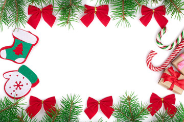 Christmas frame decorated with red bows isolated on white background with copy space for your text