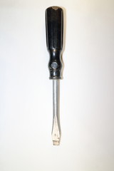 tool for work, big screwdriver with plastic handle, on white background