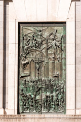 Bas-relief on the door of neo-gothic of Santa Maria la Real de La Almudena in Madrid, Spain. Vertical.