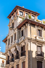 Beautiful historical building of old architecture in the city center, Madrid, Spain. Copy space for text. Vertical