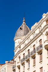 Fototapeta na wymiar View of city buildings against the blue sky, Madrid, Spain. Copy space for text. Vertical.