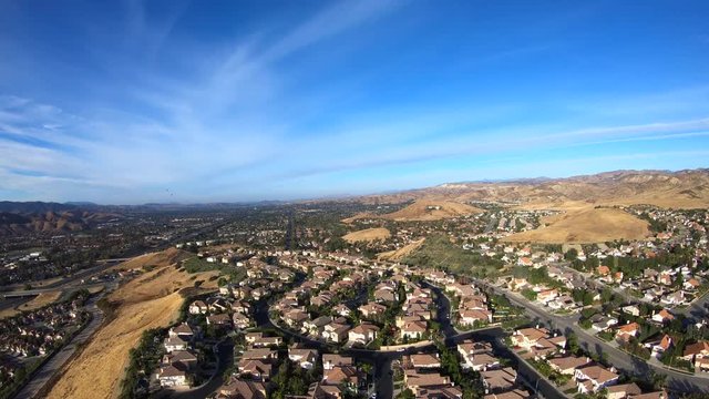 Panning aerial view of suburban Simi Valley in Southern California.