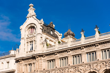 Obraz premium Beautiful historical building of old architecture in the city center, Madrid, Spain. Copy space for text.