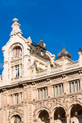 Obraz premium Beautiful historical building of old architecture in the city center, Madrid, Spain. Copy space for text. Vertical.