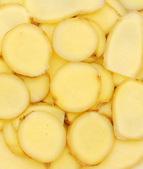 ginger root slices in isolated  background
