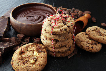 Chocolate cookies on dark table. Chocolate chip cookies.