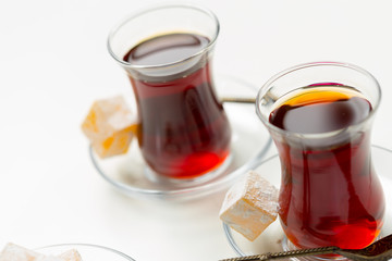 Turkish tea in traditional glass isolated on white background