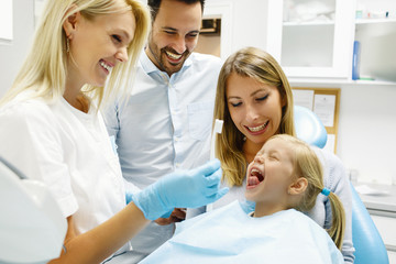 Family in dental office