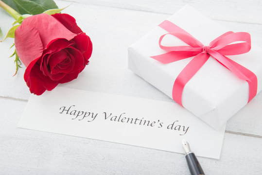 valemtine's day message with gift and rose