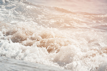 Big wave on the sea  with a lot of foam. fake color. Copy space. Concept of travel. Instagram warm filter.
